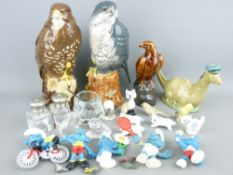 FOUR PETER THOMPSON BENEAGLES WHISKEY FLASKS, a quantity of Smurf collectables and pottery
