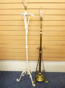 A VICTORIAN BRASS EXTENDING STANDARD LAMP and a painted wrought iron example with dragon head