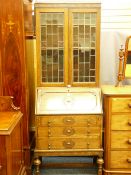 A VINTAGE OAK BUREAU BOOKCASE with leaded glass top section, 200cms height, 75cms width, 43cms