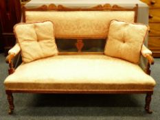 A NEATLY PROPORTIONED EDWARDIAN CARVED SALON COUCH with classical carved detail and turned front