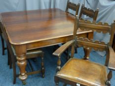 A VICTORIAN MAHOGANY WIND-OUT DINING TABLE and a set of five (4+1) oak dining chairs with rexine