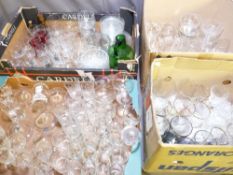 FOUR BOXES OF VARIOUS DRINKING AND OTHER GLASSWARE to include Babycham, sundae dishes, a