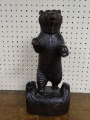 A CARVED BLACK FOREST BEAR FIGURE, 30cms high