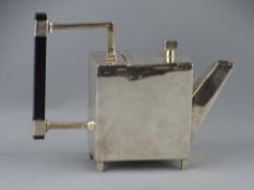 A STYLISH CUBIST FORM TEAPOT DESIGNED BY DR CHRISTOPHER DRESSER, white metal with ebonized handle,