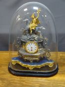 A 19TH CENTURY FRENCH GILT METAL MANTEL CLOCK on a shaped stand under a glass dome, 54cms overall