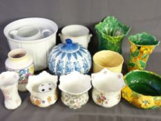 A GOOD COLLECTION OF POTTERY JARDINIERES & PLANTERS along with a hand decorated Poole pottery vase