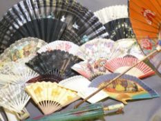 A COLLECTION OF VINTAGE DECORATIVE FANS AND PARASOLS