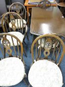 ERCOL DINING SET, dark polished drop leaf dining table and six (4 + 2) Windsor dining chairs with