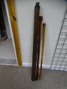 A VINTAGE TELESCOPE AND TWO WALKING STICKS
