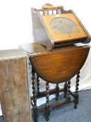 AN EDWARDIAN OAK COAL BOX with spindle back and brass handle, no liner, an oblong lidded beadwork