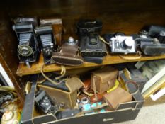 A VINTAGE CAMERA COLLECTION to include an Italian Koroll Film 120, a Zorki-4K, various bellows