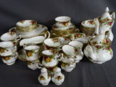 SIXTY FIVE PIECES OF ROYAL ALBERT 'OLD COUNTRY ROSES' TABLEWARE to include lidded tea and hot