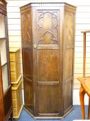 A POLISHED HALL ROBE with inset carved and plain panels