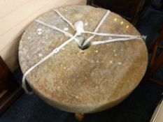 AN ANTIQUE STONE MILLER'S GRINDING WHEEL, 78cms diameter, 13.5cms thick