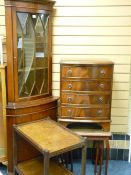 A STANDING CORNER CUPBOARD, reproduction one piece with glazed top, a nest of three glass top coffee