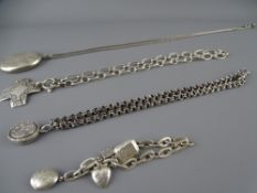 TWO SILVER LOCKETS & A CROSS on silver and white metal necklaces and a silver bracelet with