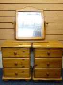 TWO SMALL MODERN PINE CHESTS each have three drawers and a pine framed toilet mirror on a platform
