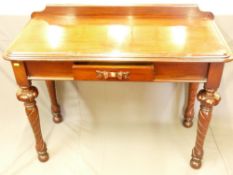 A GOOD VICTORIAN MAHOGANY HALL TABLE with shallow back rail, single central frieze drawer with