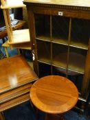 PARCEL OF FURNITURE to include a single door polished glazed front standing book case/china cabinet,