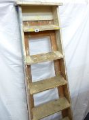 A SET OF VINTAGE WOODEN FOLDING STEP LADDERS