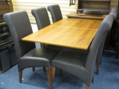 A DANISH TEAK DINING TABLE BY SKOVMAND & ANDERSEN, spacious fold over dining table on four turned