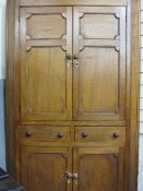 A CIRCA 1820 FLOOR STANDING PINE CORNER CUPBOARD, twin upper and lower panelled doors with diamond