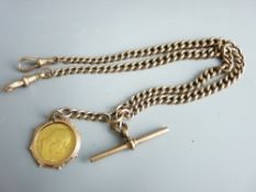 A 9CT GOLD DOUBLE ALBERT WATCH CHAIN with pendant mounted Edward VII half sovereign dated 1907,