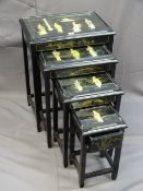 AN ORIENTAL TABLE QUARTETTO, glass topped with shibyama type decoration on ebonized timber with gilt