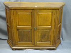 A SHAPED TOP SIDEBOARD with base cupboard doors and panel fronts, 91cms height, 122cms width,