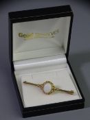 9CT GOLD BAR BROOCH with oval centre opal in a twist mount, 1 x 0.8cms, 3.4grms gross