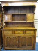 A FINE REPRODUCTION COMPACT DRESSER in the 18th century style by a well renowned Clwydian craftsman,