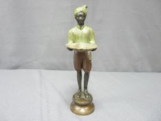 A PAINTED COLD BRONZE FIGURE of a gentleman with a shell shaped serving plate