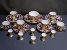 A TWENTY-SIX PIECE WILEMAN & CO CROWN DERBY IMARI STYLE BREAKFAST SET