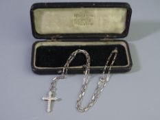 18CT GOLD CROSS, encrusted with twelve round cut diamonds, 2grms gross and a 925 silver oblong