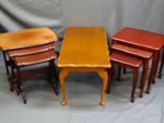 TWO SETS OF THREE REPRODUCTION MAHOGANY TABLES and a coffee table, various measurements