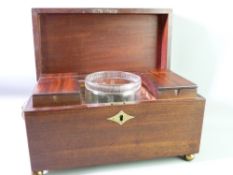 A GEORGIAN MAHOGANY TEA CADDY, lion mask and ring handles (one ring missing) on ball feet, two