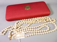 A DOUBLE STRAND NECKLACE OF MAJORCA PEARLS in original box, the silver gilt clasp stamped 925 and