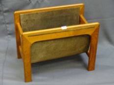 A STYLISH TEAK MAGAZINE RACK with hide separators, 40cms height, 51cms width, 30cms depth