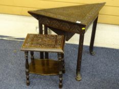 A SINGLE FLAP CARVED HALL TABLE and a similarly styled side table, 64 and 46cms heights