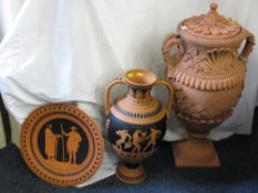 TERRACOTTA VASES, a large urn shaped vase on square plinth with a lid, twin handled with elaborate