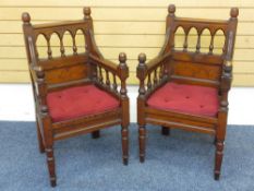 A PAIR OF PITCH PINE PEW CHAIRS with spindle back and arm detail