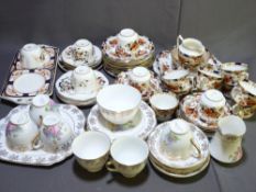 A BOX CONTAINING STAFFORDSHIRE BONE CHINA part tea services ETC