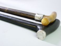 TWO VINTAGE WALKING STICKS, one horn handled, both with silver mounts, 87 and 91cms lengths