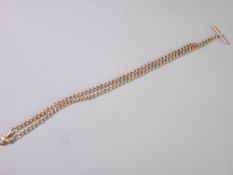 A 9CT GOLD DOUBLE ALBERT with T bar and swivel clips, 52cms overall length, 26.5grms