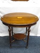 A SHERATON STYLE OVAL OCCASIONAL TABLE with centre inlaid detail, lower shelf on claw feet