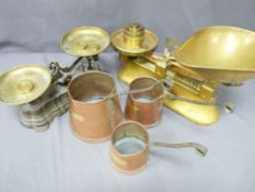 A GRADUATED TRIO OF VINTAGE COPPER, cider measures and two sets of old scales