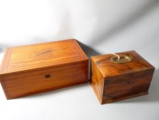 A FIGURED WALNUT JEWELLERY BOX and a satinwood writing slope (no writing surface) box