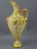 ROYAL WORCESTER EWER with mask handle and fine floral gilt relief decoration, reg no 233064, model