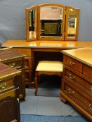 A REPRODUCTION MAHOGANY MIRRORED DRESSING TABLE, stool and matching four drawer chest with a pair of