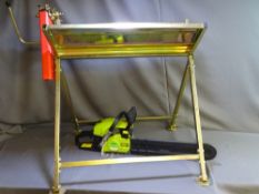 A GARDEN GEAR 52cc PETROL CHAIN SAW along with a folding log horse